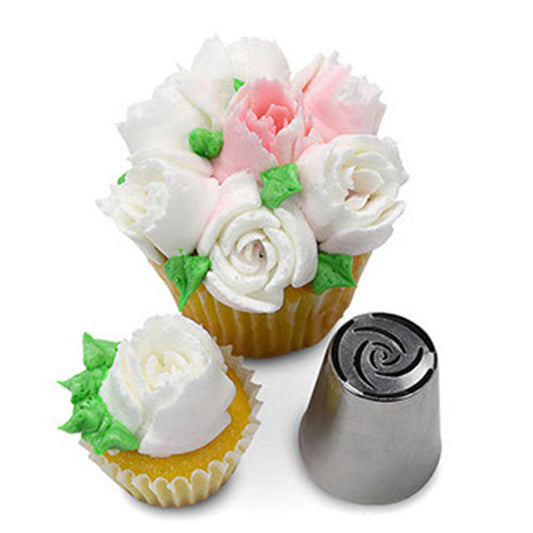 Cupcake featuring delicate white frosting flowers with hints of green leaves, created using Russian Piping Tip #243. The metal piping tip is placed next to the cupcake, demonstrating its unique design.