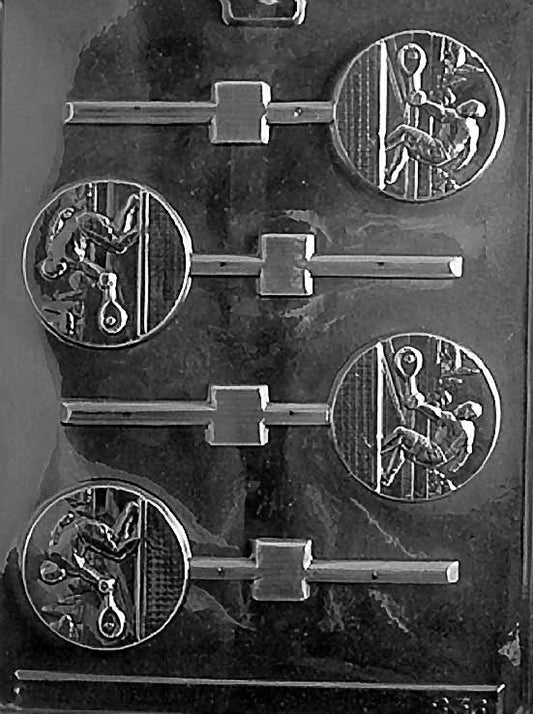 TENNIS Lollipop chocolate mold featuring round tennis ball lollipop cavities with seam detail; clear mold sheet.