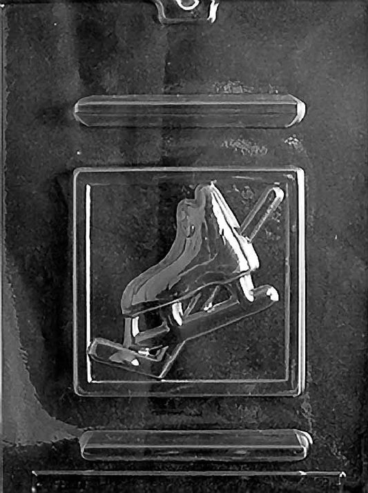 ICE HOCKEY chocolate mold with puck-shaped cavities and hockey emboss; clear mold sheet.