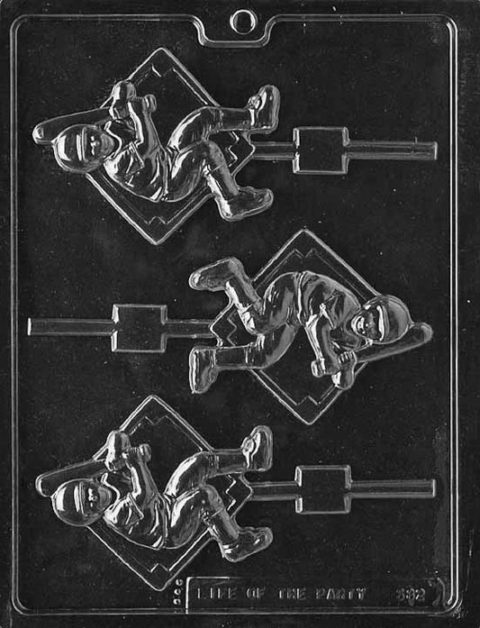BASEBALL PLAYER Lollipop chocolate mold with lollipop cavities shaped like batter swinging; clear mold with stick channel.