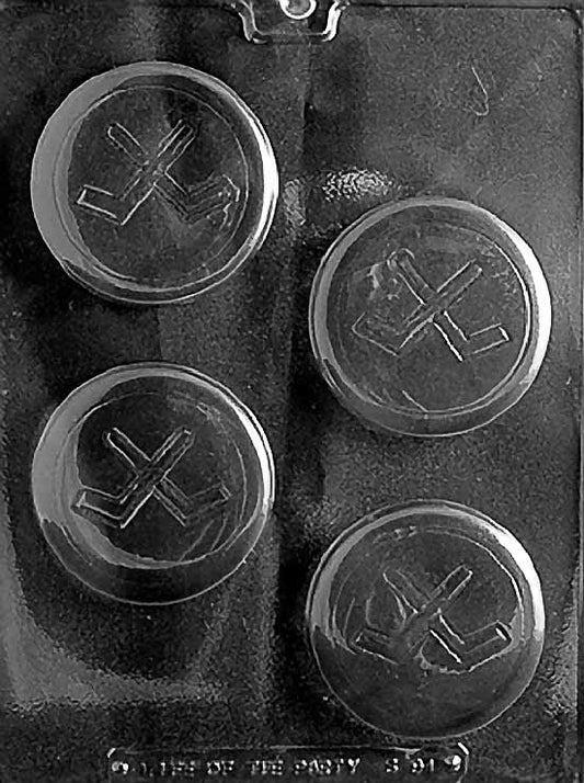 HOCKEY PUCK chocolate mold with round puck cavities; smooth flat surfaces; clear sheet.
