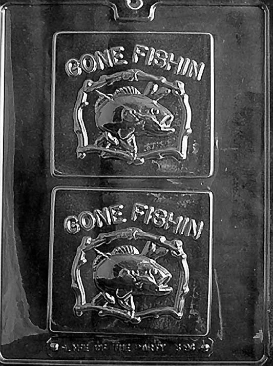 GONE FISHIN' ZODIAC chocolate mold with cavity featuring fishing-themed zodiac shape; clear mold.