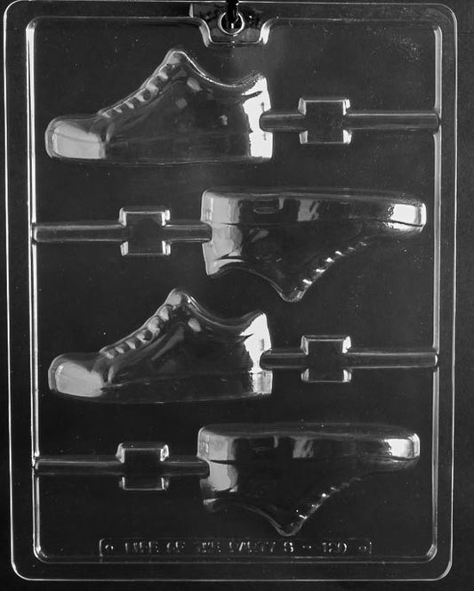 Gym Sneaker Lollipop chocolate mold with lollipop cavities shaped like sneakers; clear sheet with stick channel.