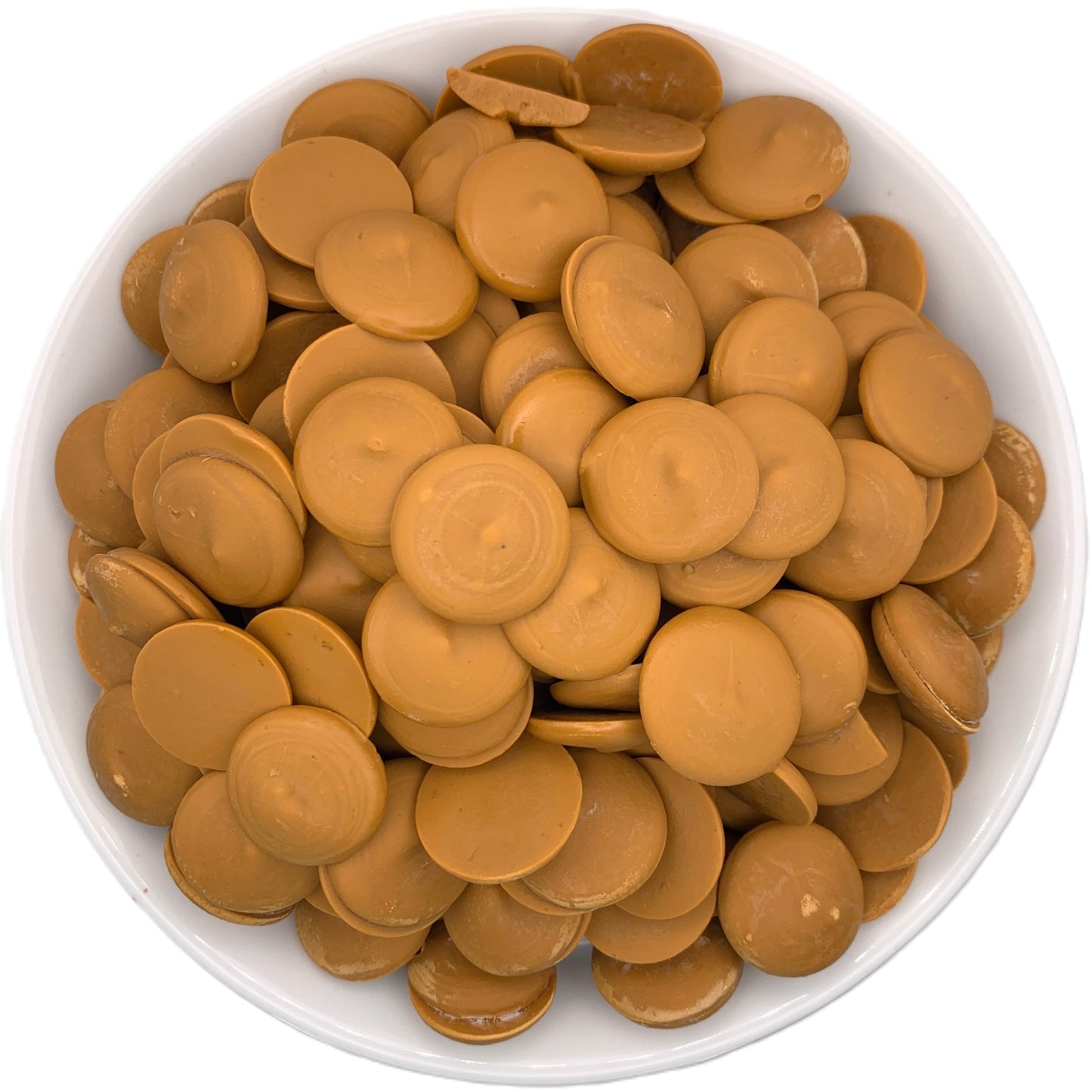 Overhead shot of sea salt caramel flavored chocolate melting wafers, displaying their unique color and inviting aroma, perfect for creating indulgent caramel-infused chocolates