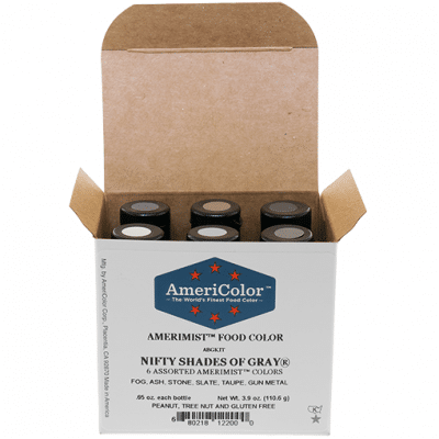 Open AmeriColor® Nifty Shades of Gray® kit box holding six small AmeriMist™ airbrush color bottles in Fog, Ash, Stone, Slate, Taupe, and Gunmetal.