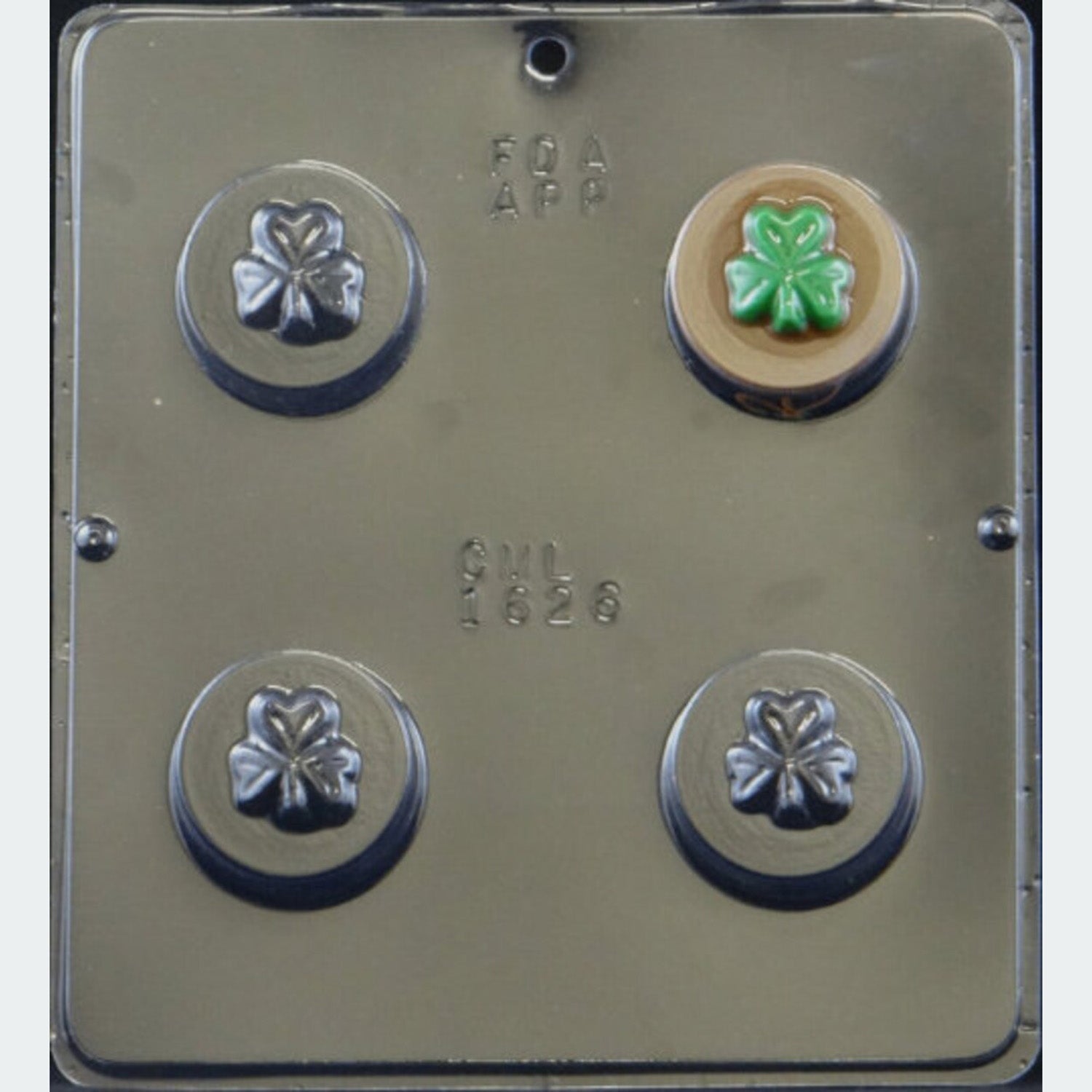 Shamrock-themed Oreo chocolate mold featuring four cavities, each approximately 2.2 inches, with a shamrock design, perfect for chocolate-covered Oreos.