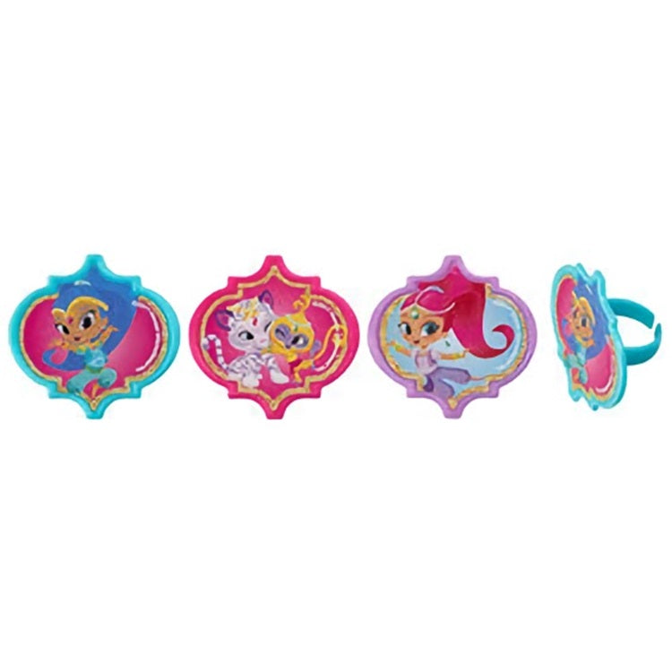 Assorted Shimmer and Shine cupcake toppers featuring colorful images of the genie duo and their pets, perfect for adding a magical touch to cupcakes. Available for your themed events at Lynn's Cake, Candy, and Chocolate Supplies.