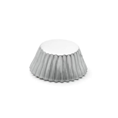 Metallic mini foil baking cup in silver with fluted sides, shown upside down on a white background.