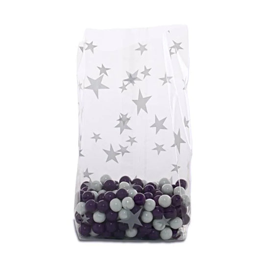 Clear gusseted cello bag with silver star pattern, filled with gray and purple candy balls, ideal for elegant party favors, weddings, or retail treat packaging.