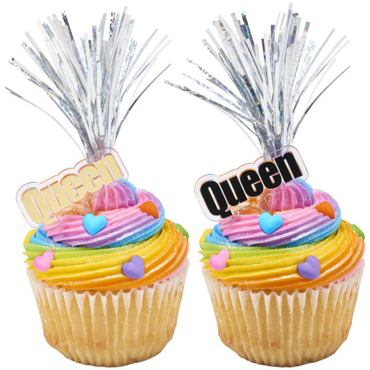 Rainbow cupcakes topped with holographic silver spray picks and "Queen" decorations
