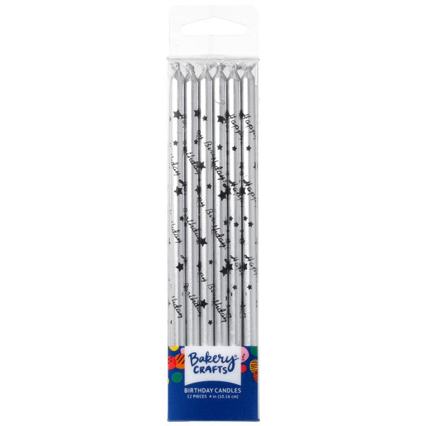 Bakery Crafts silver birthday candles in a clear plastic box, each candle printed with black “Happy Birthday” script and small black stars, 12-count package.