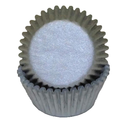 Silver standard greaseproof cupcake liners in a stack, showcasing their shiny, metallic silver finish, ideal for adding a touch of glamour to your desserts.