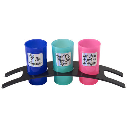 A black holder with three colorful shot glasses featuring fun party quotes.