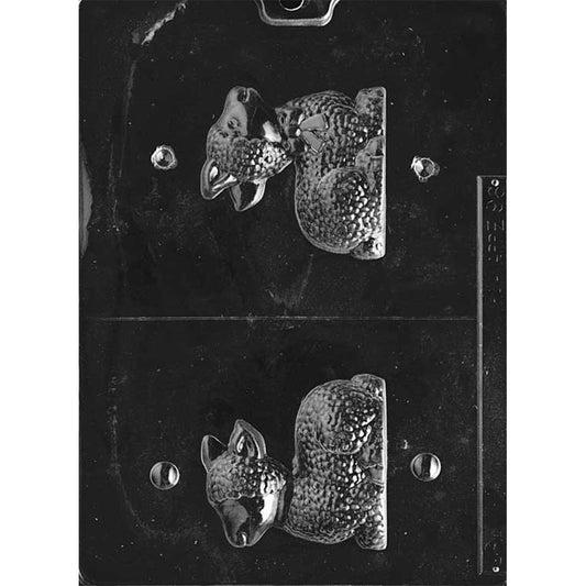 Clear plastic lamb with bow 3D chocolate mold with two molded cavities showing a small lamb figure with textured wool and a bow detail, designed for forming a hollow chocolate lamb.