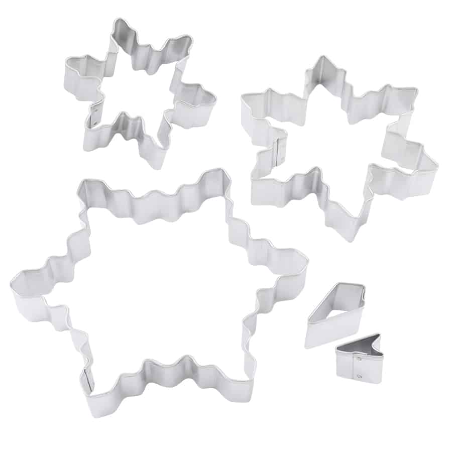 Five tinplated steel snowflake cutters in various sizes arranged on a white background.