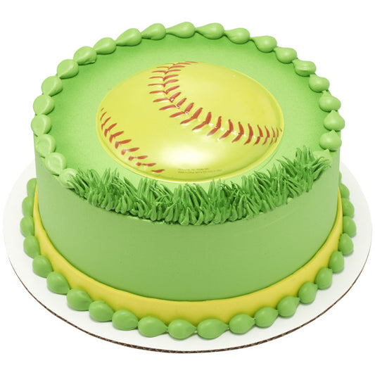 Round green frosted cake topped with yellow softball Pop Top® and piped grass accents for a sporty design.