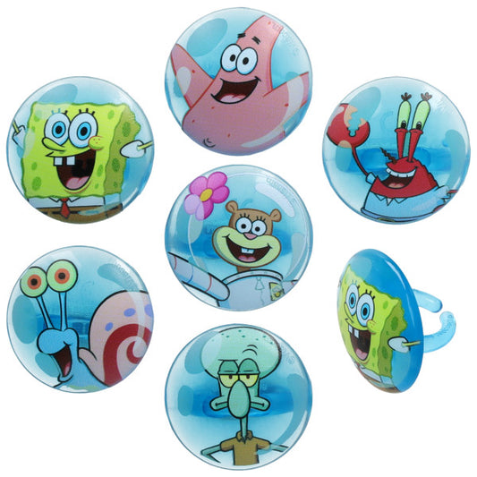 Assorted SpongeBob SquarePants themed cupcake rings with round blue toppers featuring colorful cartoon sea character faces, shown on a white background with one ring angled sideways.