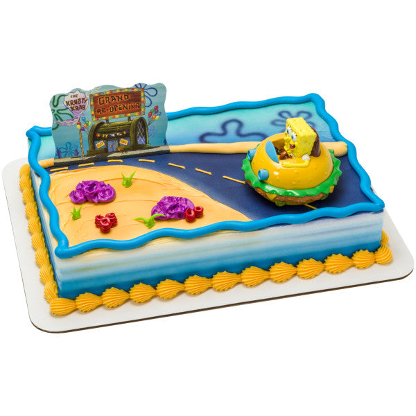 Rectangular cake decorated with an underwater road theme, the Krusty Krab topper, and SpongeBob in his Krabby Patty car.