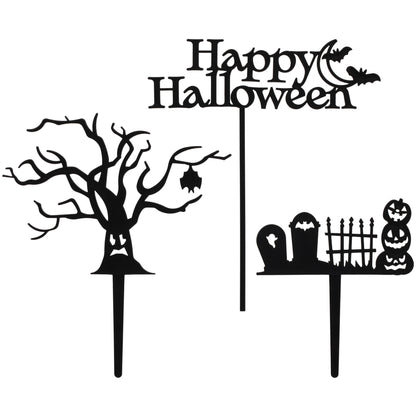 Three-piece black Spooky Tree & Graveyard Halloween Cake Kit featuring a twisted haunted tree with bat, graveyard with pumpkins and fence, and Happy Halloween moon cake pick.