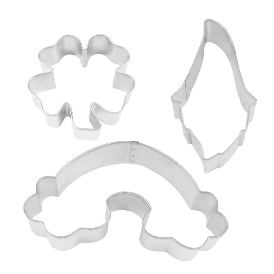 Three tinplated steel cookie cutters displayed individually, showing the distinct clover, rainbow, and gnome shapes.