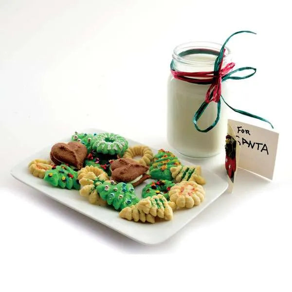 Plate of colorful cookies with milk jar labeled "For Santa".
