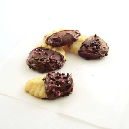Chocolate-dipped cookies with pink and chocolate sprinkles.