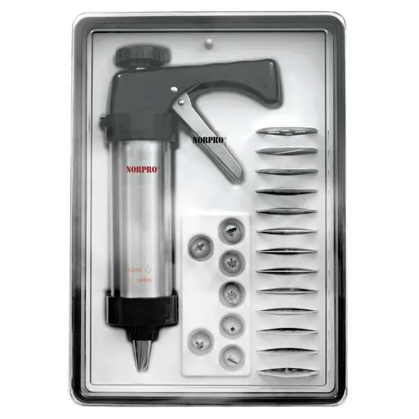 Norpro cookie and icing press set in packaging tray, featuring press gun, 8 icing tips, and 13 cookie disc plates.