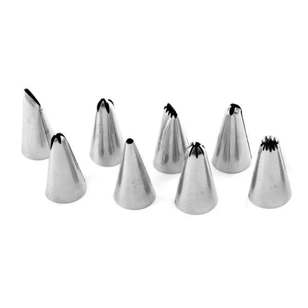 Stainless steel icing tips from the kit displayed in a group.