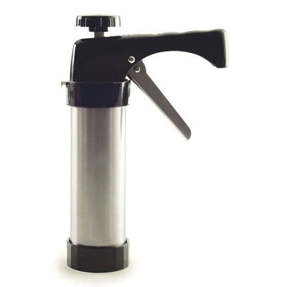 Side view of stainless steel cookie and icing press gun with black handle and trigger on white background.
