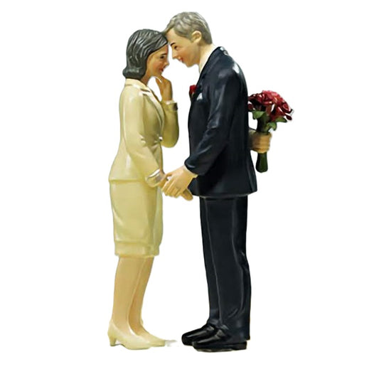 Still in Love mature couple cake topper depicting an elegant older couple in a tender embrace, with realistic detailing, suitable for anniversary cakes celebrating enduring love and companionship.