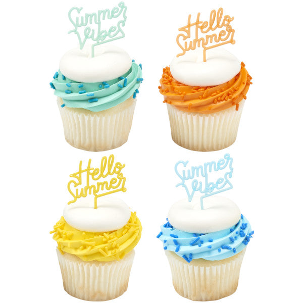 Cupcakes with white frosting, colorful sprinkles, and pastel Summer Saying picks reading “Hello Summer” and “Summer Vibes.”