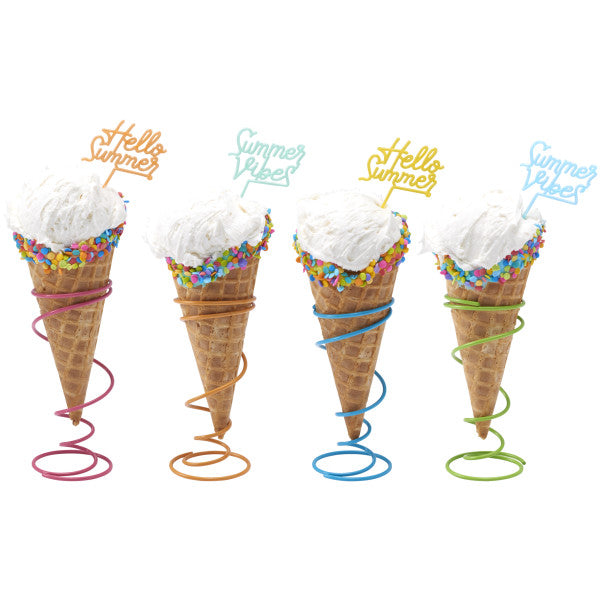 Waffle ice cream cones decorated with rainbow confetti sprinkles and topped with colorful Summer Sayings picks.