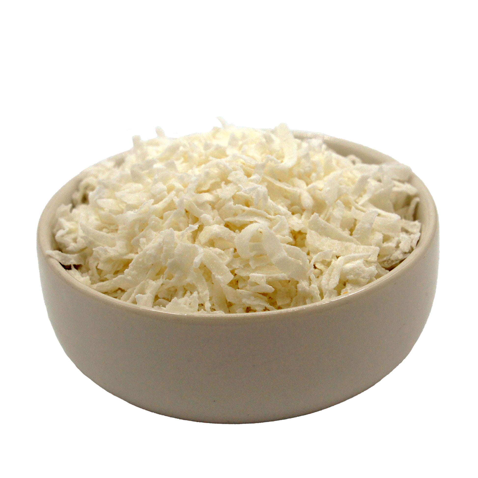 Bowl filled with sweetened coconut flakes for baking and dessert recipes
