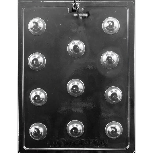 A clear plastic mold with multiple cavities shaped for making bon bon chocolates with a swirl design on top.