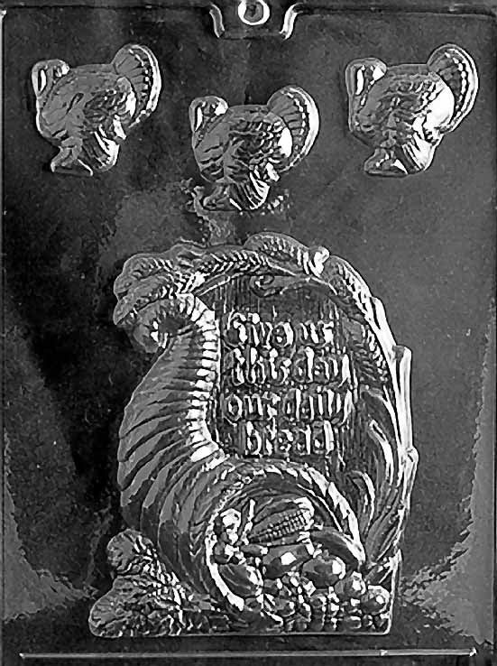 GIVE US THIS DAY chocolate mold with rectangular cavities engraved with inspirational text; clear sheet.