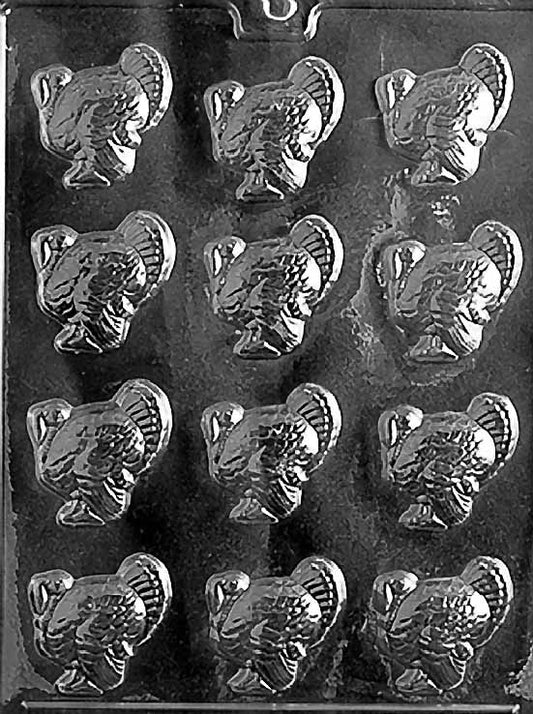 SMALL TURKEYS chocolate mold with cavities shaped like small turkeys; clear sheet.