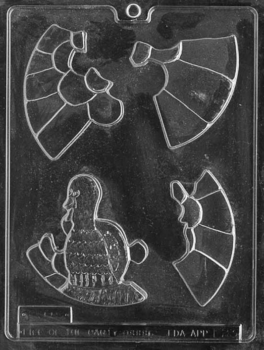 TURKEY PUZZLE chocolate mold with cavities forming turkey puzzle pieces; clear sheet.
