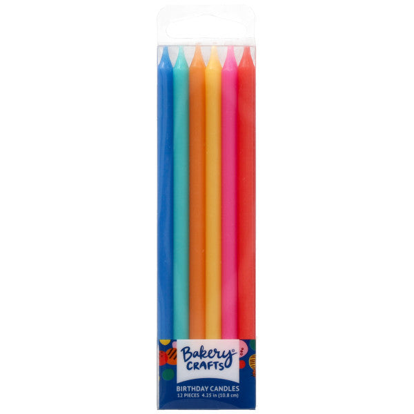 Clear Bakery Crafts package of tall bright assorted birthday candles in blue, teal, yellow, orange, pink, and red, arranged upright inside a rectangular box.