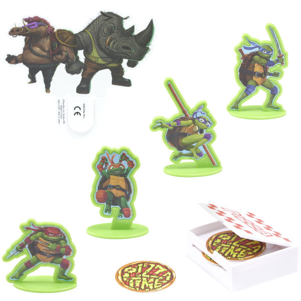 Teenage Mutant Ninja Turtles™ Pizza Power! DecoSet® featuring TMNT character standees, Bebop and Rocksteady, a pizza box launcher, and three pizza discs.