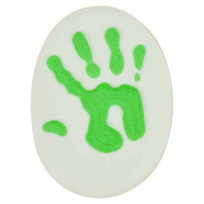 Decorated oval cookie with a green handprint design.