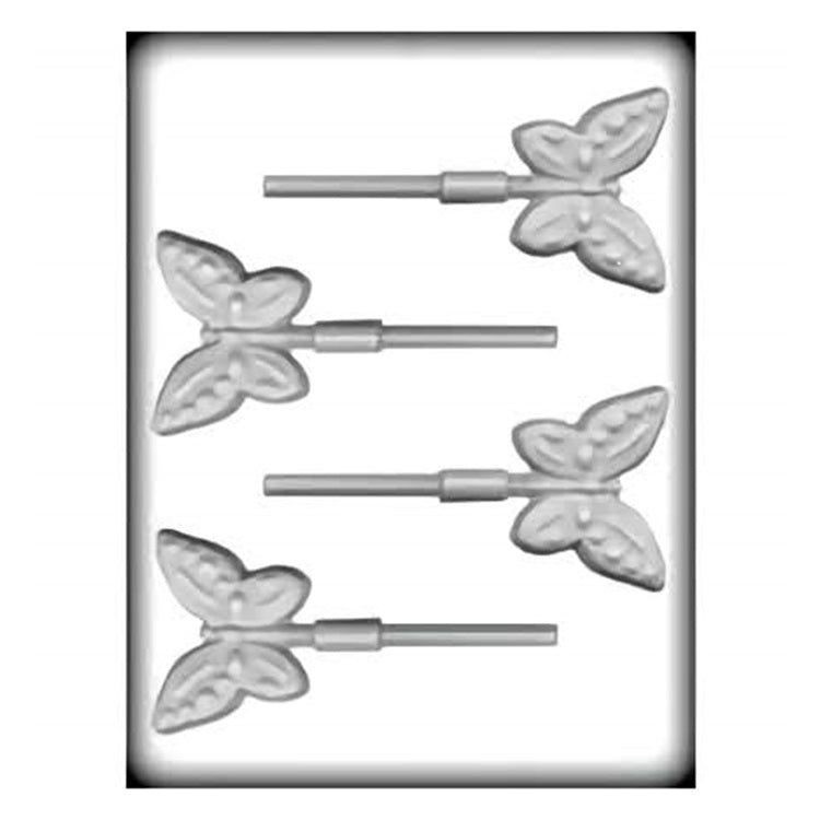 A white hard candy mold for making thick butterfly shaped suckers. There are four cavities in each mold with a slot for accepting a sucker stick