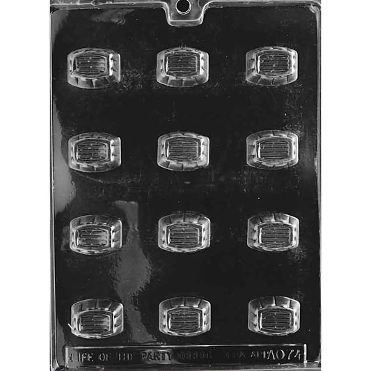 Traditional Lined Pieces Chocolate Mold with twelve rectangular cavities, each featuring a lined design. The mold creates 1-3/8 inch by 1 inch and 3/4 inch deep chocolate pieces, using approximately 0.4 ounces of chocolate per piece. Made of food-grade plastic and manufactured in the USA.