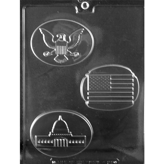 Clear chocolate mold with three oval patriotic cavities featuring a bald eagle with shield, a raised U.S. flag, and the U.S. Capitol building.