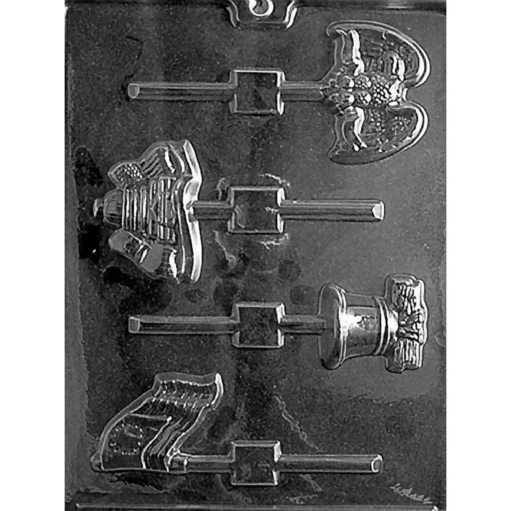 Clear plastic chocolate lollipop mold with four patriotic design cavities including an American eagle, Capitol building, Liberty Bell, and colonial flag, with stick channels for making assorted USA-themed chocolate pops.
