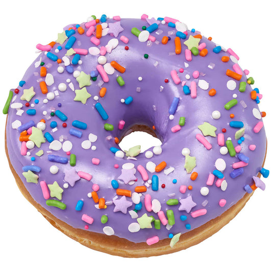 A donut with smooth purple frosting, generously topped with a colorful blend of party sprinkles featuring pastel stars, rods, and beads, adding a playful and cheerful touch to the treat.