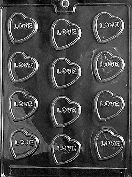 HEARTS WITH LOVE chocolate mold with heart cavities embossed with the word “Love”; clear mold.