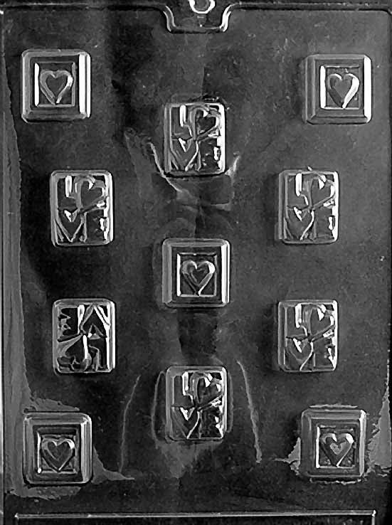 LOVE SQUARES chocolate mold with small square cavities embossed with “Love”; clear mold.