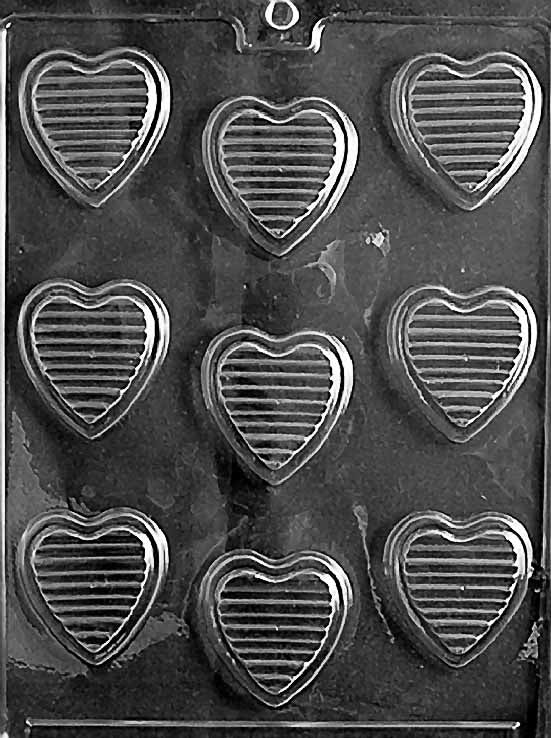 HEARTS WITH RIDGES chocolate mold with ridged heart-shaped cavities; clear mold.