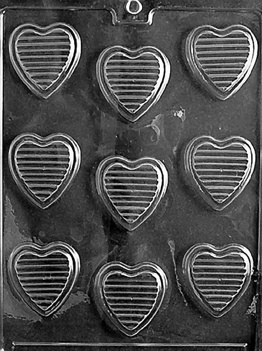HEARTS WITH RIDGES chocolate mold with ridged heart-shaped cavities; clear mold.