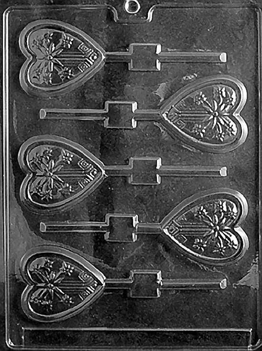 STARBURST HEART Lollipop chocolate mold with heart lollipop cavities decorated with starburst lines; clear sheet.